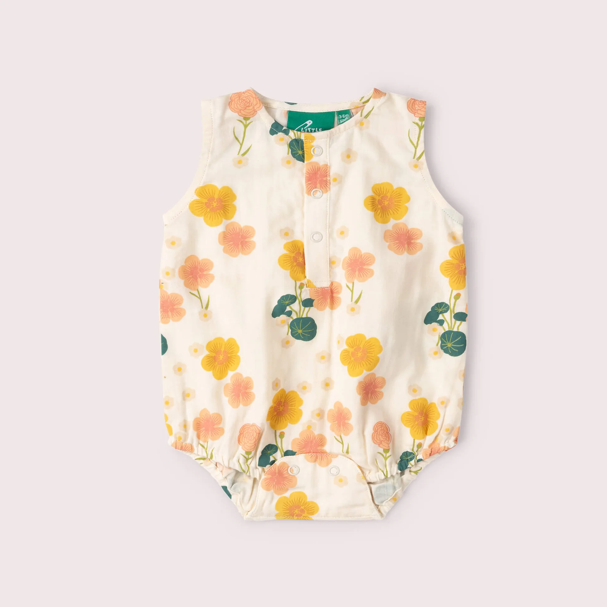 Barboteuse bébé Little Green Radicals Flora en coton biologique : légère, douce et confortable pour accompagner bébé pendant l’été.