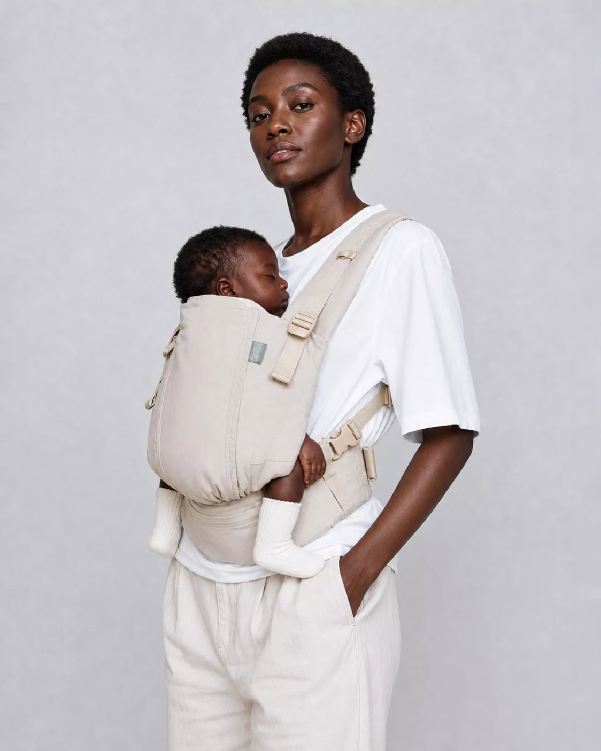 Porte-bébé One Evo LOVE AND CARRY Wheat : évolutif dès la naissance jusqu'à 15 kg, confortable et toutes saisons. Tablier en coton et en mesh - Etoiles en portage
