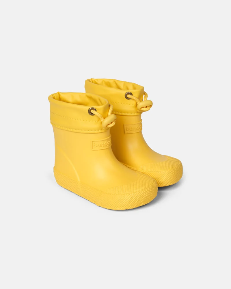 Bottes pluie barefoot BUNDGAARD Cover Sunflowers en caoutchouc naturel. Ultra-légères, souples, imperméables et adaptées aux premiers pas - Etoiles en portage